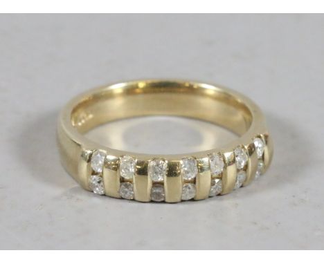 A 9ct gold fourteen stone diamond ring 0.36cts, size M.