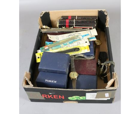A box of wristwatches and straps including Timex quartz digital bracelet watches.