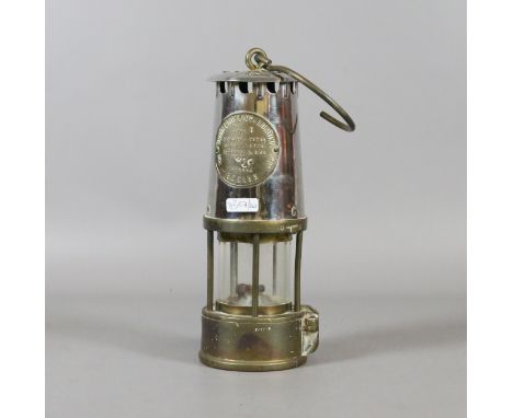 A brass and chrome miners safety lamp by Eccles.