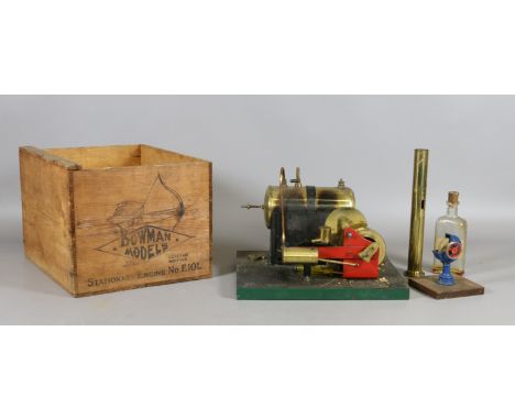 A stationary live flatbed steam engine and accessories in pine case stencilled for Bowman models.