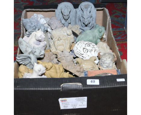 A collection of grotesque figures and plaques.