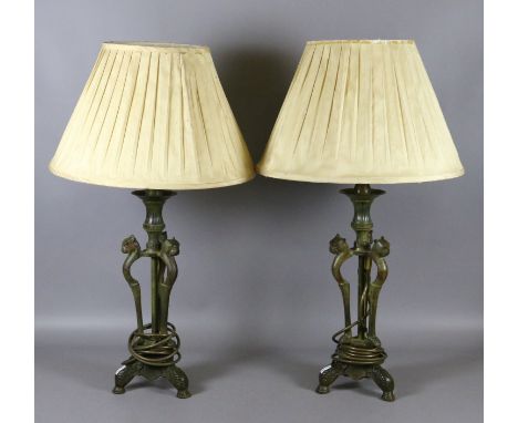 A pair of vintage bronzed based figural tablelamps and shades.