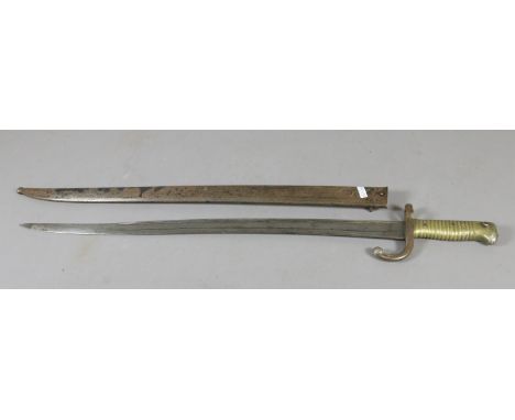 A French 1874 pattern sword bayonet in metal scabbard.