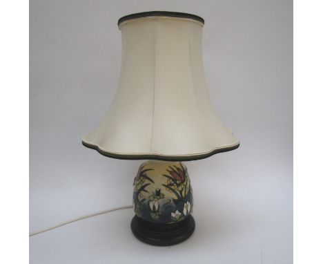 A Moorcroft table lamp base with water lily design, 43cm tall with shade