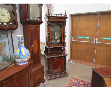 A Victorian walnut cased Polyphon, coin operated with 19" discs, (16) retailed by Walter Jones of Derby, turned spindle suppo