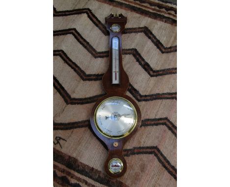 A 19th Century style mahogany cased four dial wall barometer with silvered dial, string border