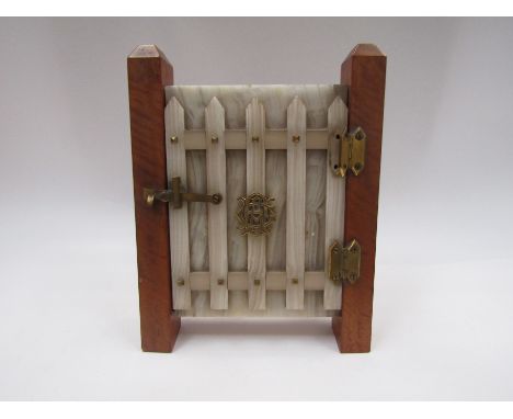 A late Victorian satinwood and onyx novelty easel back photograph frame as a closed garden gate with ormolu mounts, opening t