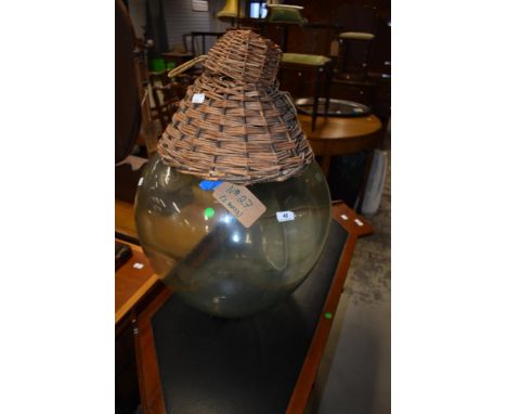 A vintage glass carboy