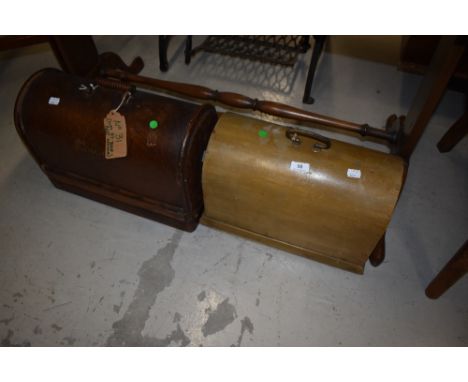Two vintage sewing machines in dome top cases