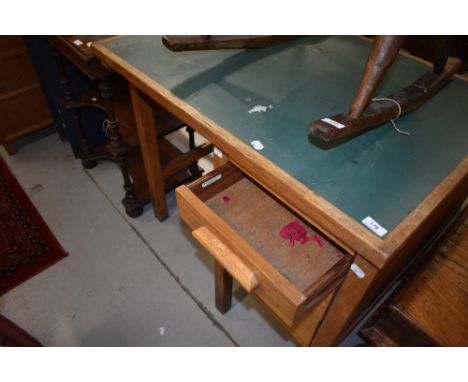 A vintage oak desk of small proportions with single bank of three drawers
Desk is 92cm long x 64cm wide x 76cm tall&nbsp;