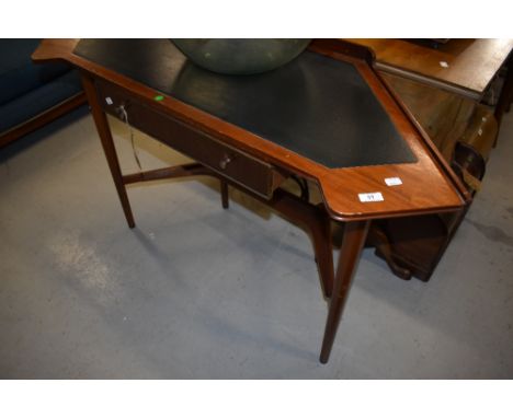 A vintage sapele side or dressing table of stylised form