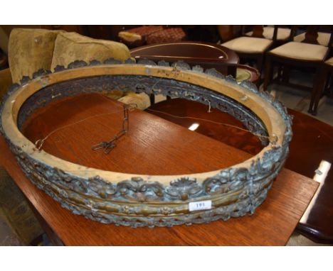 A vintage brass light surround