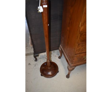 An early 20th Century mahogany standard lamp