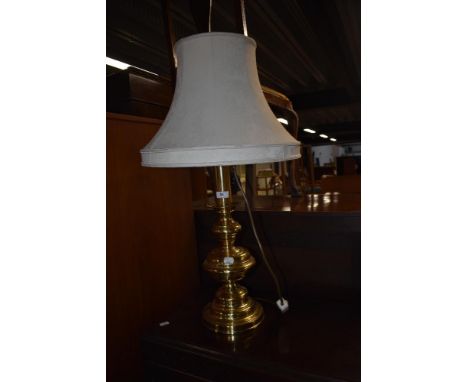 A brass table lamp