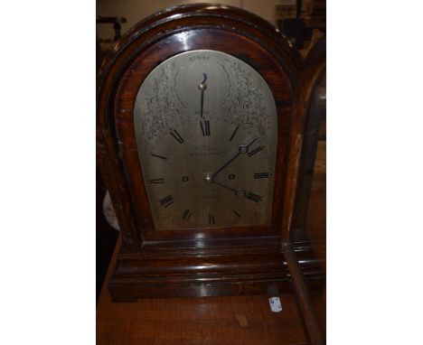 A late 19th/early 20th Century oak cased bracket clock , having silvered dial signed W Johnson, London, double fusee movement