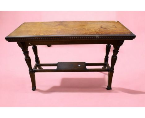 An early 20th Century mahogany reproduction ladies desk along with an early 20th Century oak buffet/hall table.