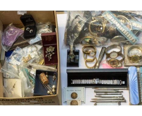 A collection of various items to include a silver engine turned pencil, along with silver plated versions, coloured pencils, 