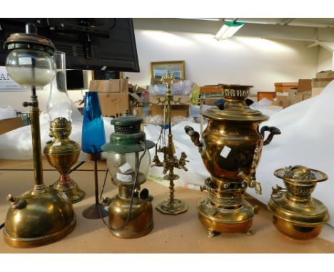 A collection of 19th and 20th Century oil lamps to include continental, Tilley lamps, citrine oil lamp etc.&nbsp;some with we