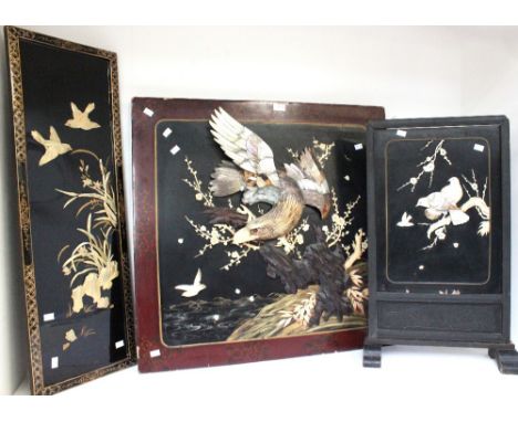 A large 1920s Chinese panel with a large eagle and foliage design decoration along with an early 20th Century Chinese ornate 