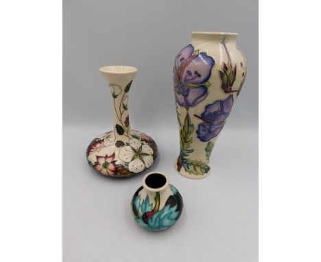 A Moorcroft vase in the Meadow Cranesbill design by Alicia Amison , approximate height 20cms, factory second (silver line) to