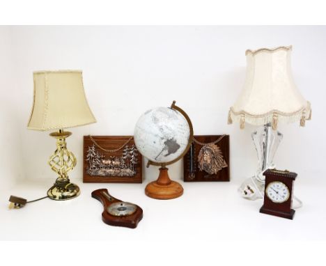 Two 20th Century table lamps, a mid 20th Century globe, wall plaques and mantle clock.