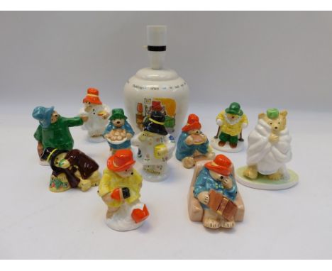 A collection of vintage Coalport Paddington Bear porcelain figures with lamp base. good condition