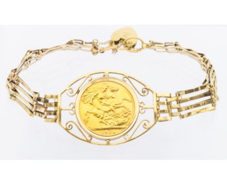 A Elizabeth II sovereign dated 1964, mounted in 9ct gold to a 9ct gold gate link bracelet, total weight approx 15.9gms   Furt