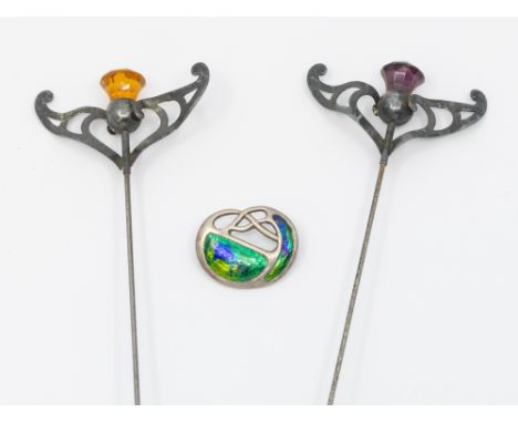 Two early 20th century Charles Horner hallmarked silver hat pins, each with elaborate scrolled mounted designs and central th