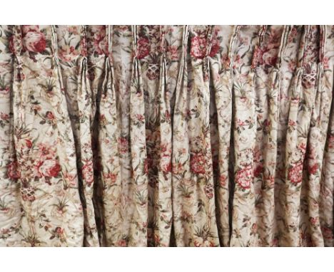 Two large curtains in a rose liberty print from the mid 1970s, fully lined, padded and weighted with pleated pelmets along wi