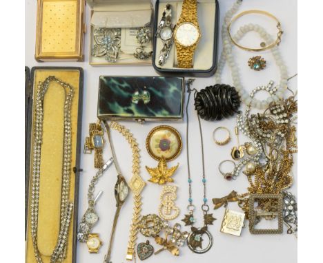 A collection of costume jewellery including two a ruby set pendant in yellow metal testing as 14ct gold, total gross weight a