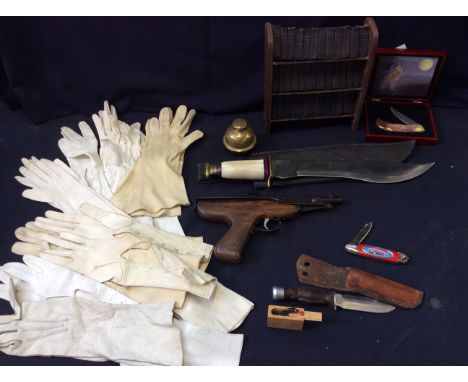 A vintage air pistol, knives, and other sundry items. To include: a Diana MKIV air pistol, a small sheath knife with leather 