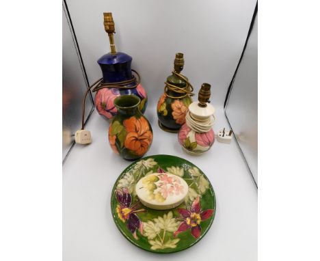 A Moorcroft "Hibiscus" pattern vase and lamp base Coral Hibiscus design by Walter Moorcroft with a "Magnolia" pattern lamp ba