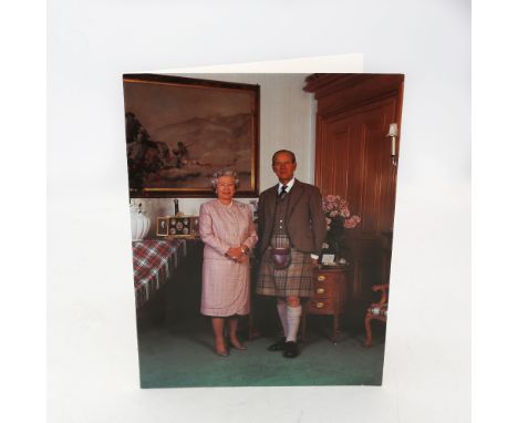 HM Queen Elizabeth and HRH The Duke of Edinburgh; a signed (autopen)1995 Christmas card, with twin gilt Royal cyphers to inte