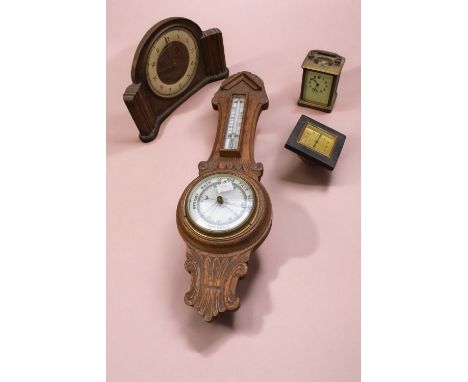 A late 19th Century French brass mantle clock with Arabic numerals, two mid 20th Century mantle clocks and an Edwardian oak w