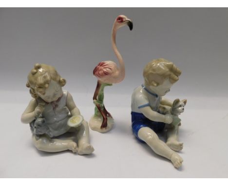A pair of German mid 20th Century porcelain child figures along with Goebel pink flamingo,&nbsp;good condition , no chips, cr