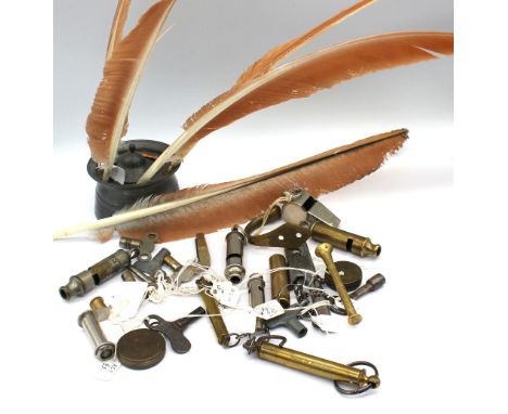 Pewter pen stand along with a collection of quills, vintage whistles, compasses, clock keys, hooks etc.
