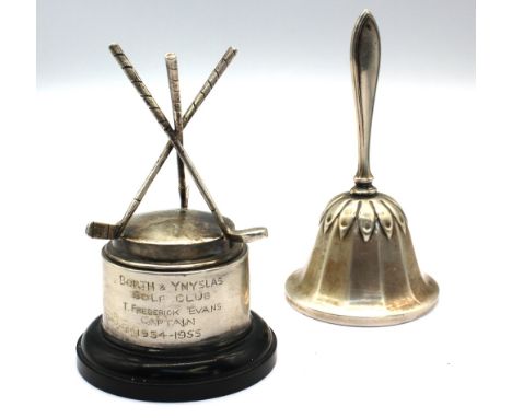 A George VI silver small bell, hallmarked by Suckling Ltd, Birmingham, 1939, approx. 11.5cm long, together with a novelty Eli