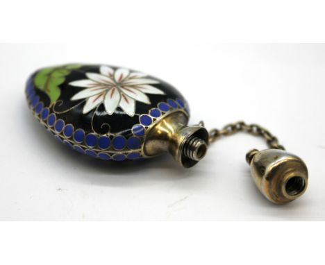 A 20th century cloisonné enamelled scent bottle, having lotus flower decoration with leaves, upon black ground with blue deta