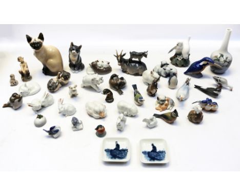 A collection of Royal Copenhagen figures, plates, vases and bowls, some with boxes&nbsp;, most good , small number with fault