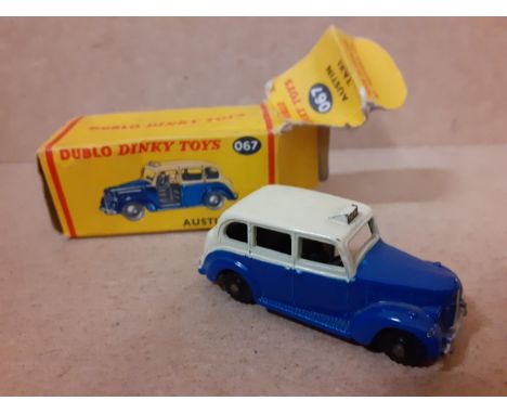 A Dublo Dinky Toy 067 Austin Taxi in original box (box A/F), together with a quantity of vintage Meccano Location: Cab/RWM 