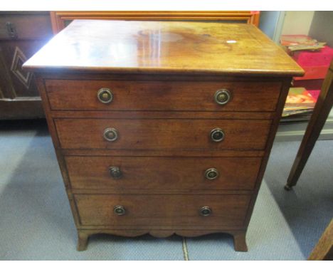 A Georgian mahogany commode in the form of a four drawer chestLocation: 