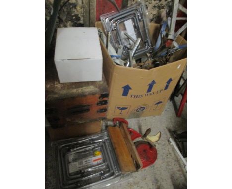 A large mixed lot to include gardening tools, petrol cans, Antler case, vintage car horns, lamps, axle stands and other items