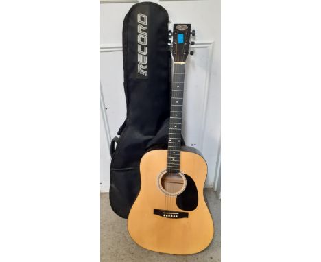 A Stagg acoustic guitar, model SW203W with padded travel bag and a folio of sheet musicLocation:RWB 