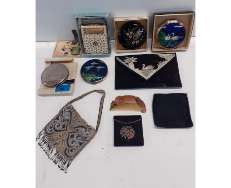 A selection of vintage compacts and other items to include a white metal 'Jerusalem' compact stamped 833, Stratton examples t