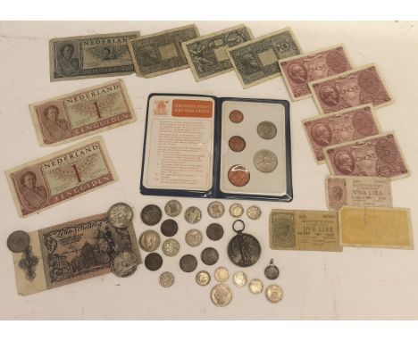 A mixed lot of coinage to include late 19th/mid 20th century sixpence and shillings a 'Lords Prayer Florin' 1940's banknotes 
