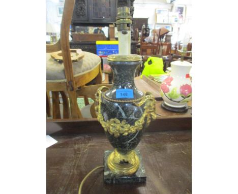 A 20th century green onyx and gilt metal table lamp in the form of an urn with ram mask and swag ornamentLocation: 