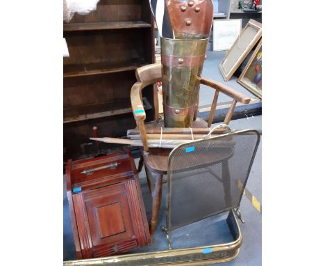 An early 20th century tub chair, a mahogany coal scuttle with scoop, a vintage cricket set, two umbrellas and an Arts and Cra