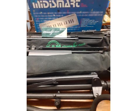 Music stands and accessories, a Midismart keyboard, a Pocket Pal Hohner, a recorder and a melodica Location: LWB 
