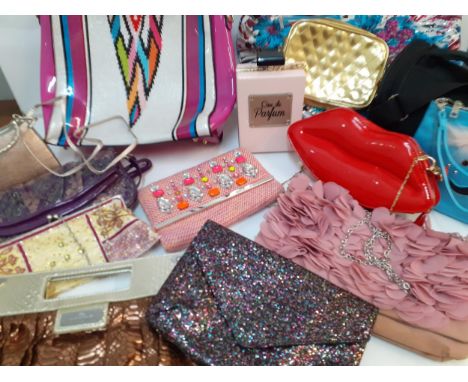 A selection of modern High Street handbags to include an Aldo Lips handbag, one in the form of a perfume bottle, and othersLo