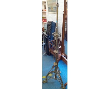 A late Victorian brass oil lamp stand converted to electricityLocation: RAF 